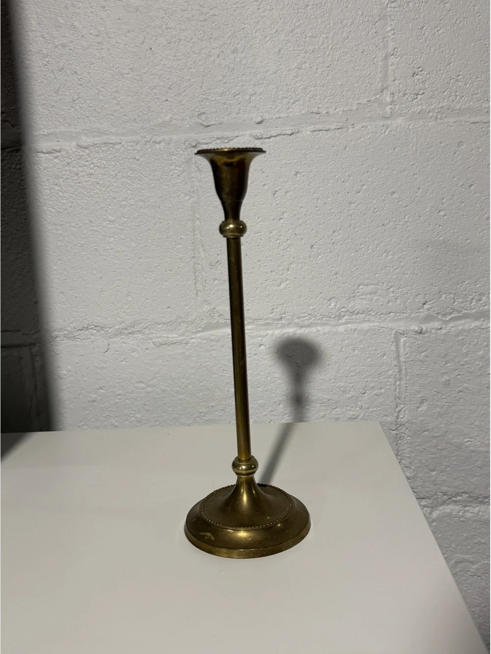 Vintage brass tall delicate beaded rim candlestick